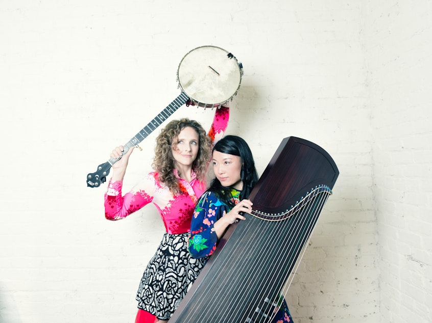 caption: Abigail Washburn and Wu Fei are masters of Appalachian and Chinese folk music, respectively. On their self-titled debut album they combine traditional songs from across the U.S. and China.