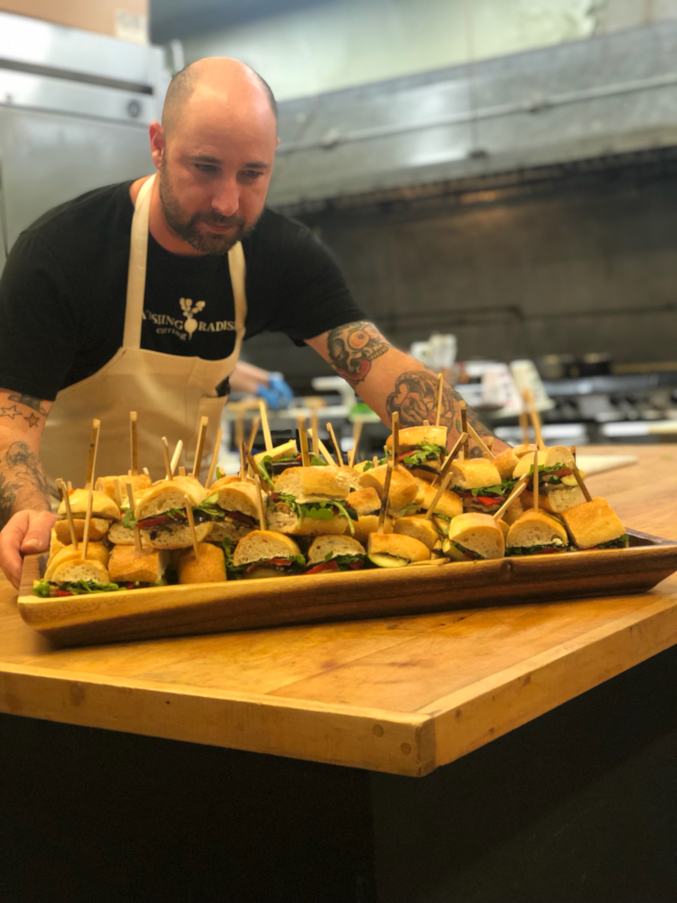 caption: Gary Barbo had just been promoted to head chef at Ravishing Radish Catering when the novel coronavirus struck the Seattle area.