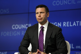 caption: Acting Homeland Security Secretary Kevin McAleenan listens to a question at the Council on Foreign Relations on Monday in Washington, D.C.
