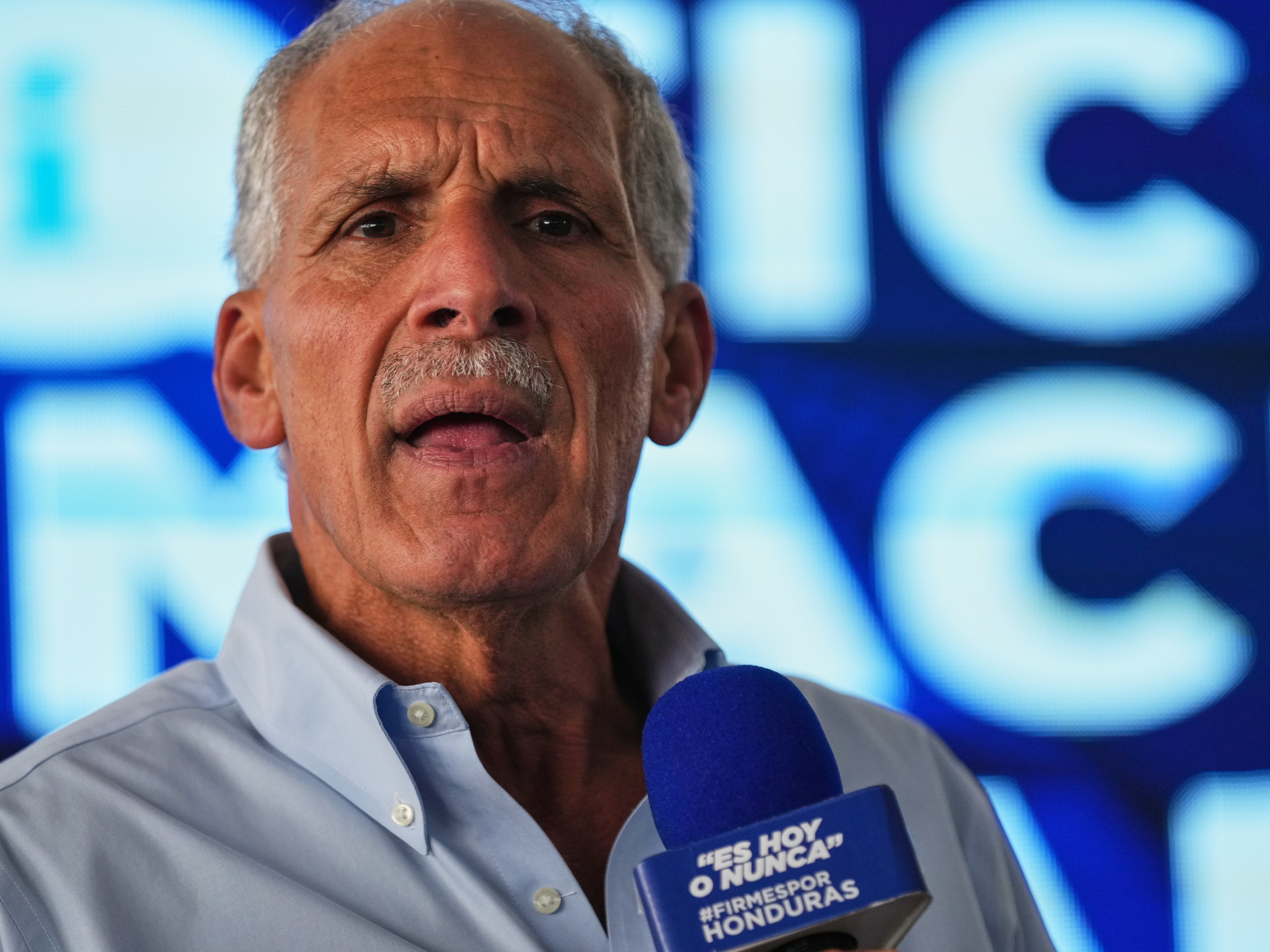 caption: Presidential candidate Nasry Asfura, of the National Party, gives a press conference in Tegucigalpa, Honduras, Monday, Dec. 1, 2025.