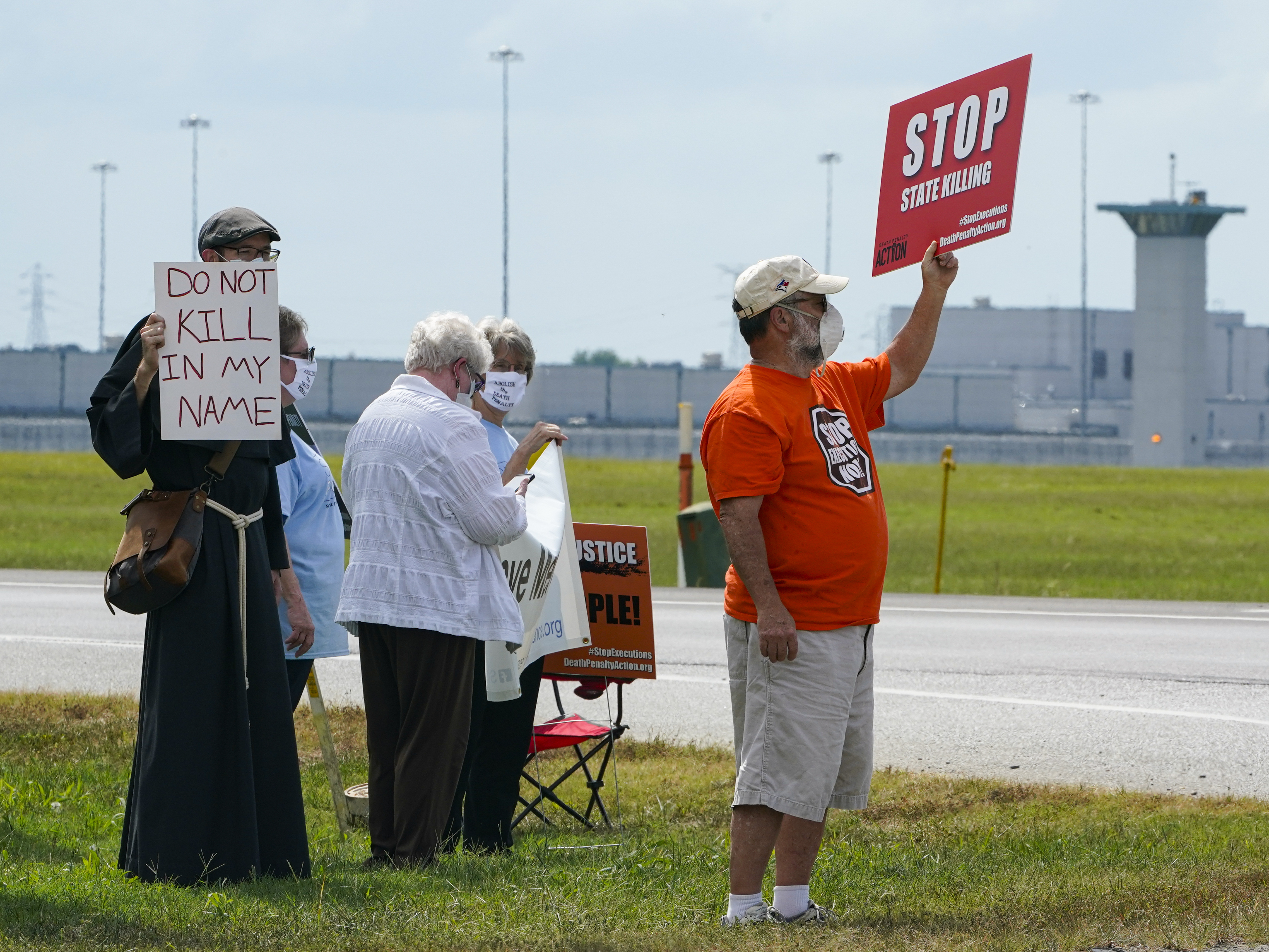 caption: Demonstrators gathered across from the federal prison complex in Terre Haute, Ind., to protest the death penalty. Another execution is scheduled for Thursday.
