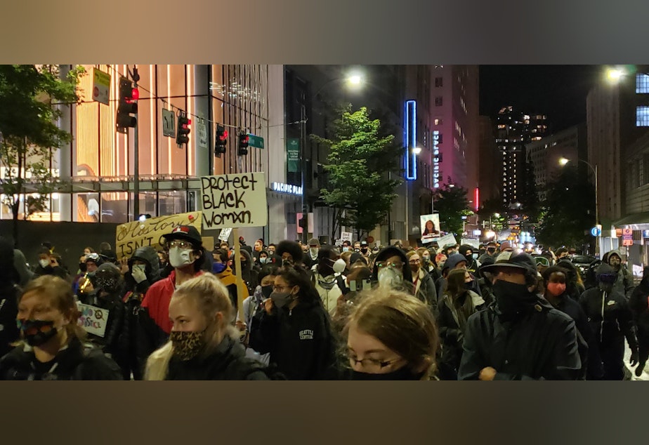 caption: A march near Westlake Park in Seattle, following an announcement about the Breonna Taylor case in Kentucky, Sept. 23, 2020.
