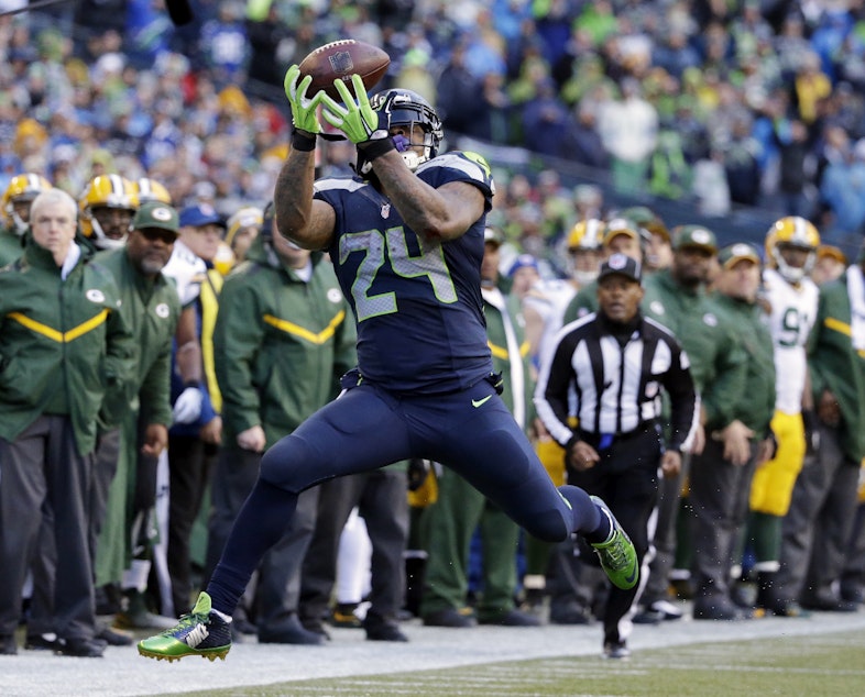 caption: FILE - In this Jan. 18, 2015, file photo, Seattle Seahawks' Marshawn Lynch catches a pass during the second half of the NFL football NFC Championship game against the Green Bay Packers, in Seattle.