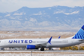 caption: A United Airlines jetliner rumbles down a runway for take off from Denver International Airport after a winter storm swept through the region Tuesday, Jan. 16, 2024, in Denver.