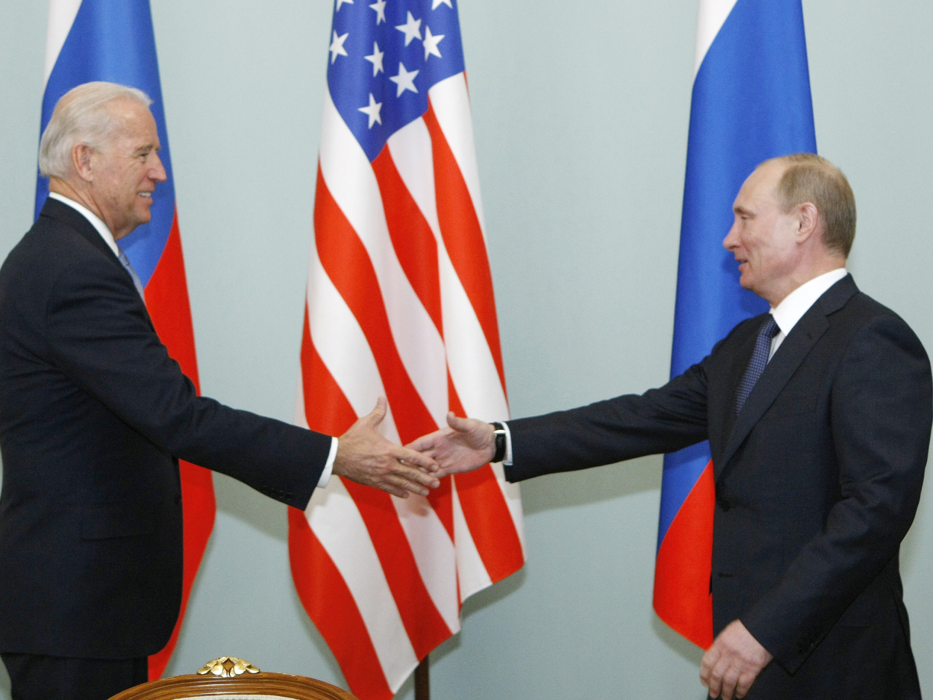 caption: Joe Biden and Vladimir Putin, seen here in 2011 when the U.S. president was vice president and his Russian counterpart was prime minister, are scheduled to meet June 16 in Geneva.