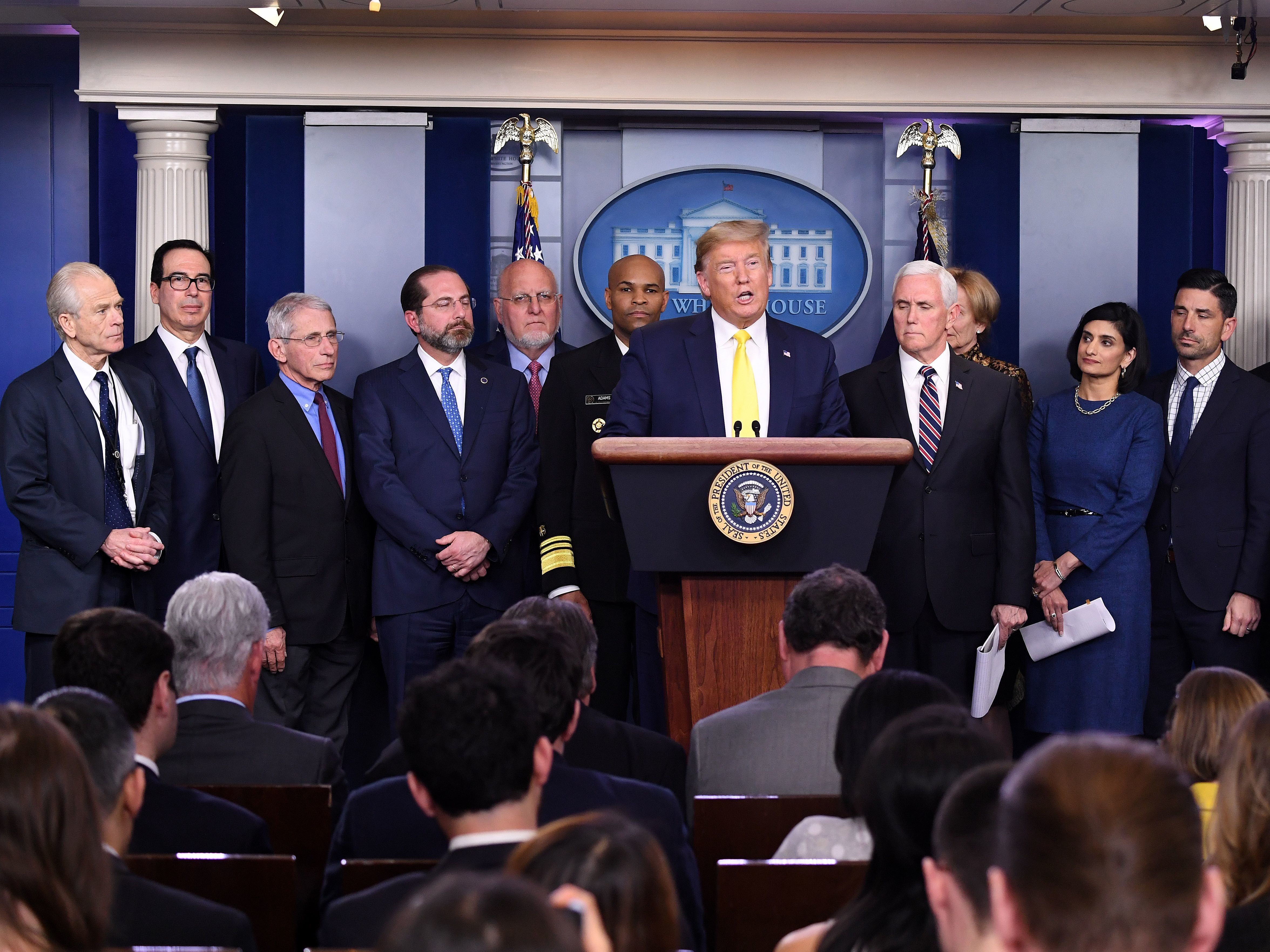 caption: President Trump speaks about the coronavirus alongside Vice President Mike Pence and members of the Coronavirus Task Force in the Brady Press Briefing Room at the White House in Washington, D.C., Monday.
