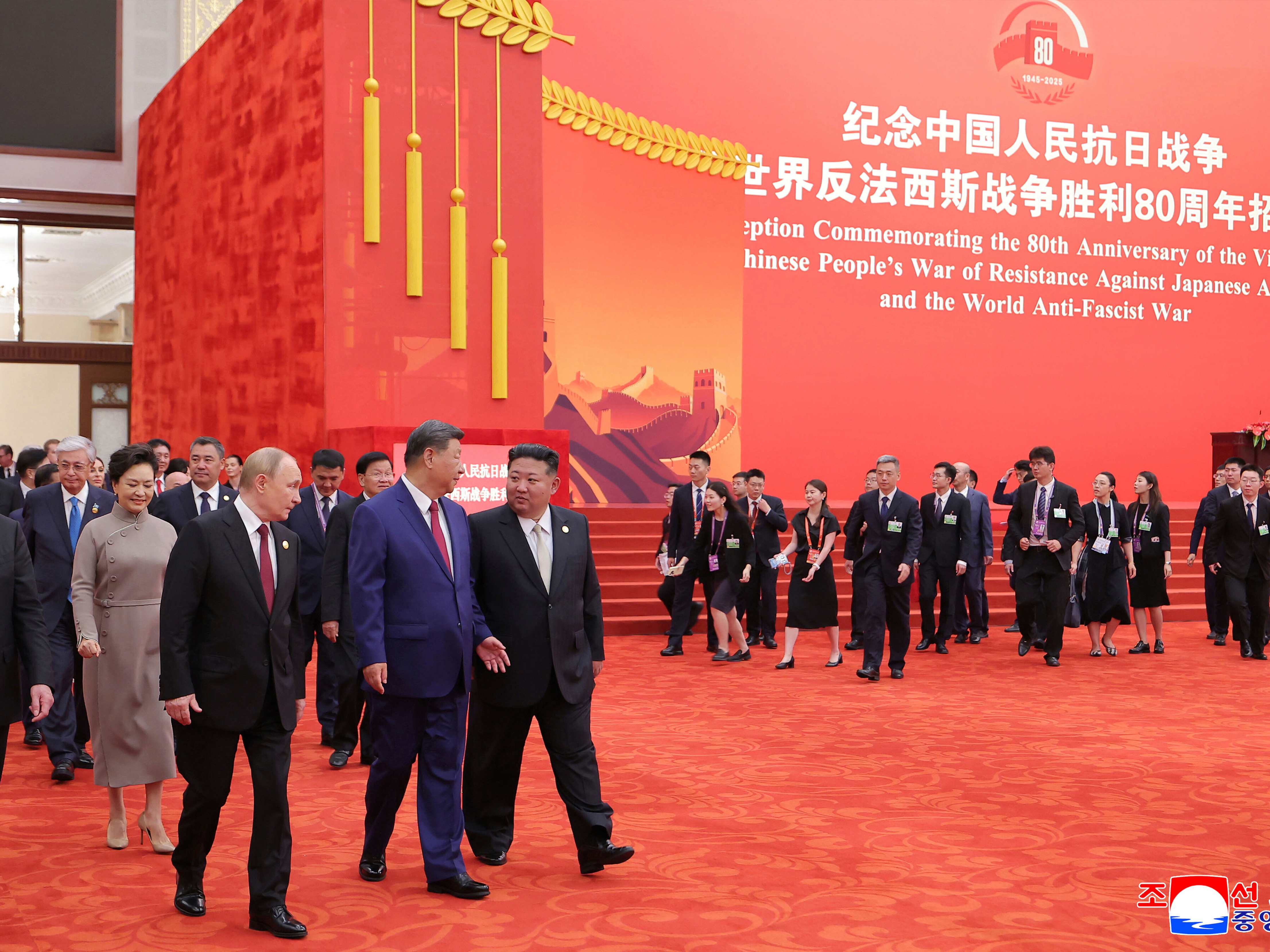 caption: In this photo provided by the North Korean government, from second left in front, Russian President Vladimir Putin, Chinese President Xi Jinping and North Korean leader Kim Jong Un arrive for a reception marking the 80th anniversary of the end of World War II, at the Great Hall of the People in Beijing Wednesday, Sept. 3.