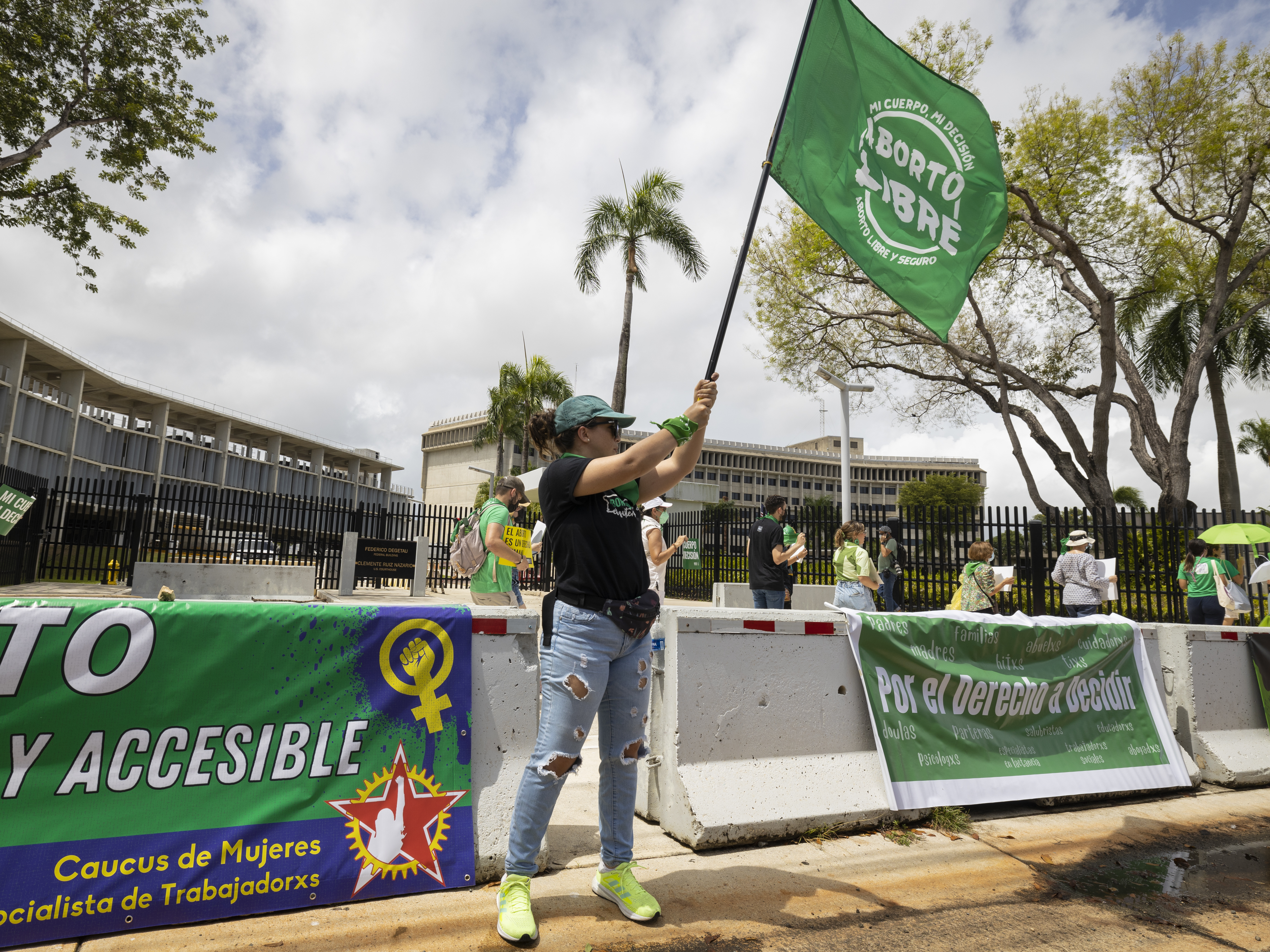 caption: Abortion-rights protesters demonstrate in San Juan, Puerto Rico, in July.