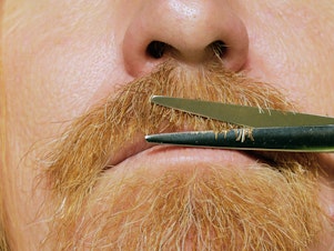 caption: In self-isolation, facial hair is a growing trend.