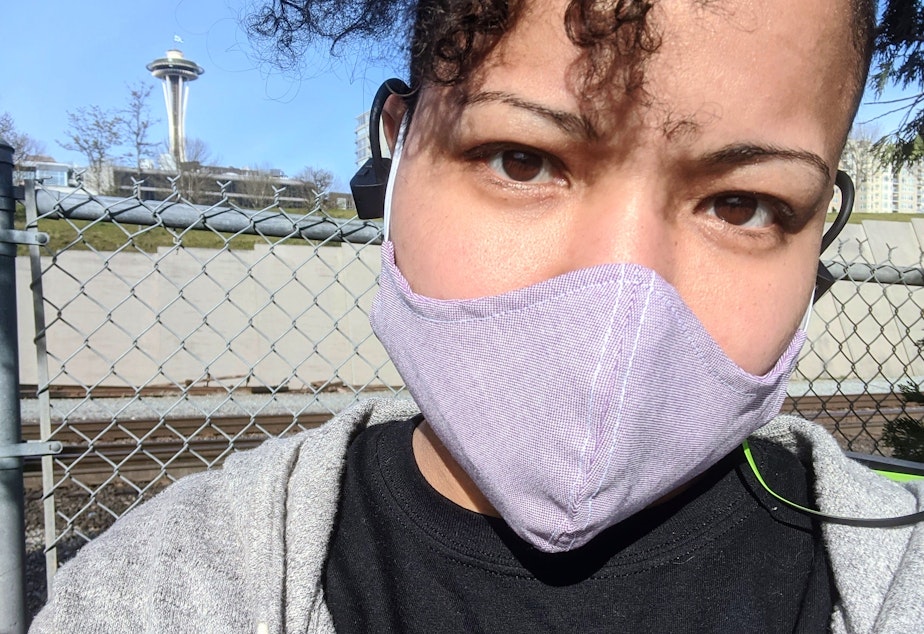 caption: Mellina White in her COVID-19 mask. April 13, 2020, Seattle. 