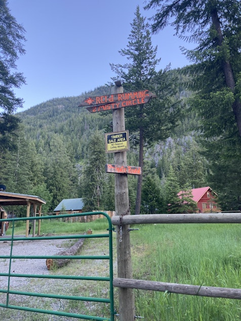 caption: A signpost directs travelers down a road in Mazama, an unincorporated community in the Methow Valley. Residents are regularly at risk of wildfire damage in the valley. 