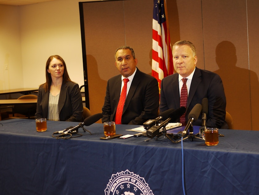 caption: Jay S. Tabb, Jr. (far right) heads the FBI's Seattle office.