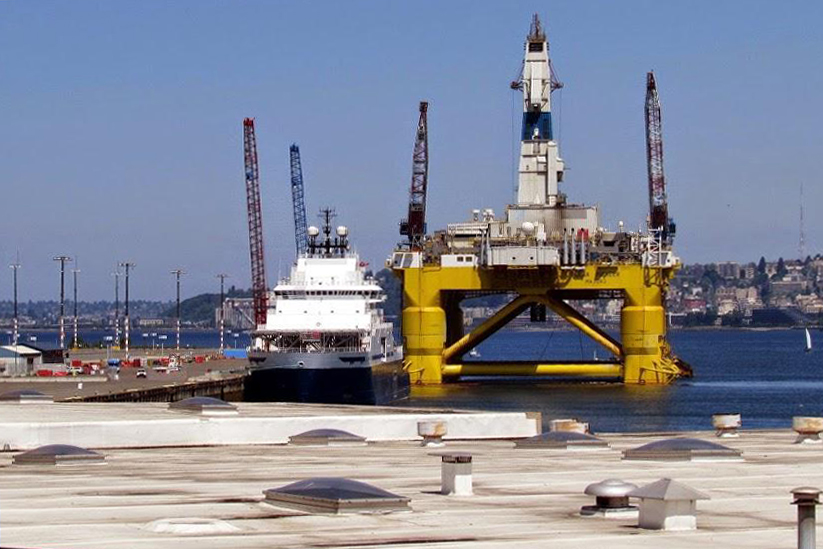 caption: The Polar Pioneer oil rig in Terminal 5 at the Port of Seattle this summer.