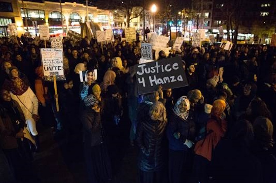 caption: People rally on Capitol Hill on Thursday in memory of Hamza Warsame, a 16-year-old Somali American who died in a fall from an apartment building.