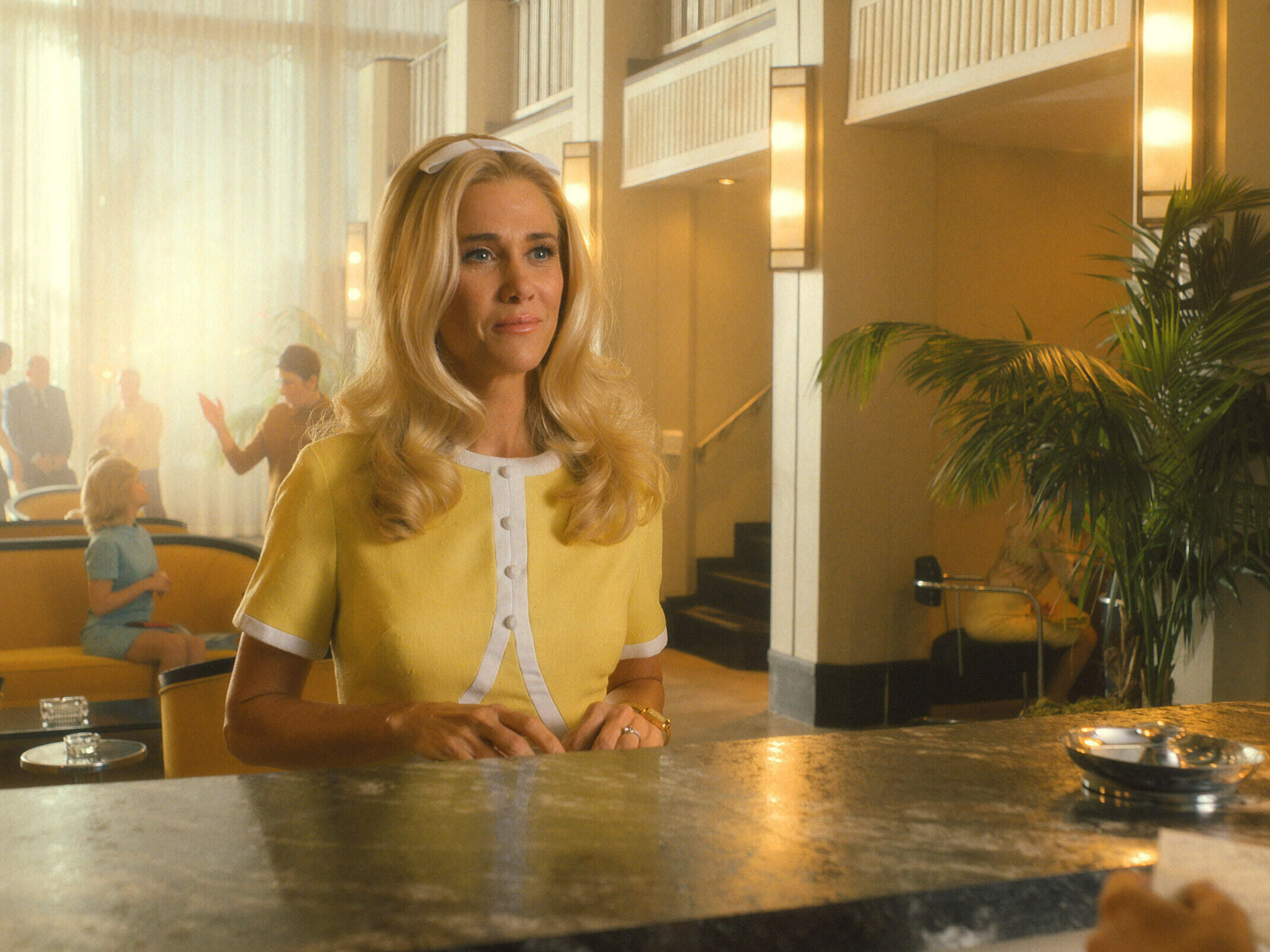 caption: Kristen Wiig plays a former pageant queen in <em>Palm Royale.</em>