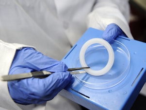 caption: This is the vaginal ring that releases the antiretroviral drug dapivirine to ward off HIV infection. The ring is now going into wider distribution in sub-Saharan Africa, where girls and young women age 15 to 24 accounted for more than 77% of new HIV infections in 2022, according to UNAIDS.