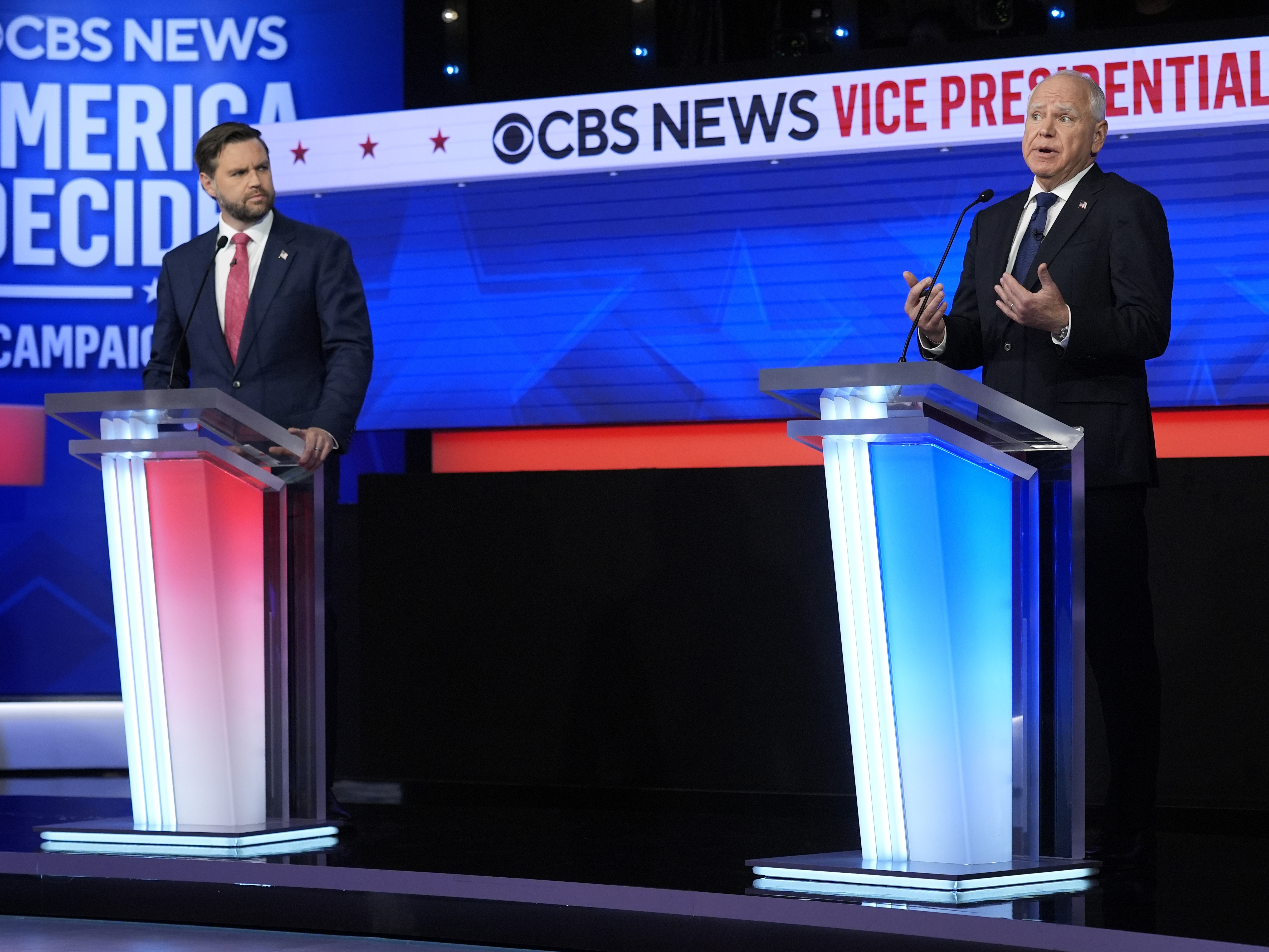 caption: Republican vice presidential nominee Sen. JD Vance of Ohio and Democratic vice presidential nominee Minnesota Gov. Tim Walz participate in a debate hosted by CBS News on Tuesday in New York.