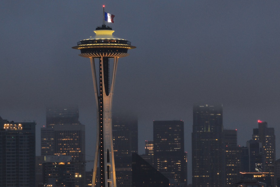 caption: The French flag flies over the Space needle on Saturday Nov. 14. It was one of several displays of solidarity with France in Seattle after the terrorist attacks on Nov. 13.