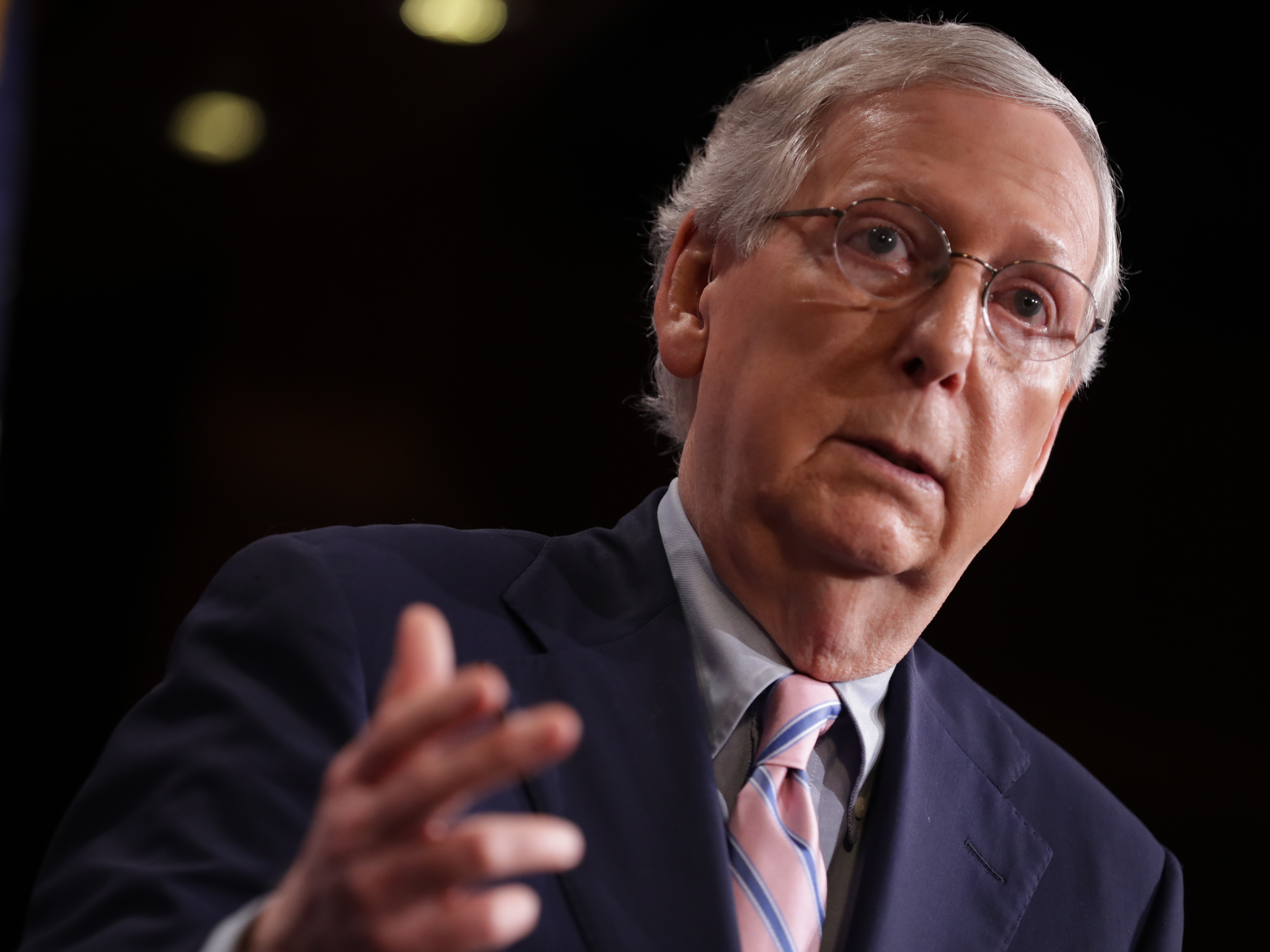 caption: Republican Senate Majority Leader Mitch McConnell of Kentucky talks to reporters after the Senate voted to confirm Supreme Court nominee Judge Brett Kavanaugh on Oct. 6.