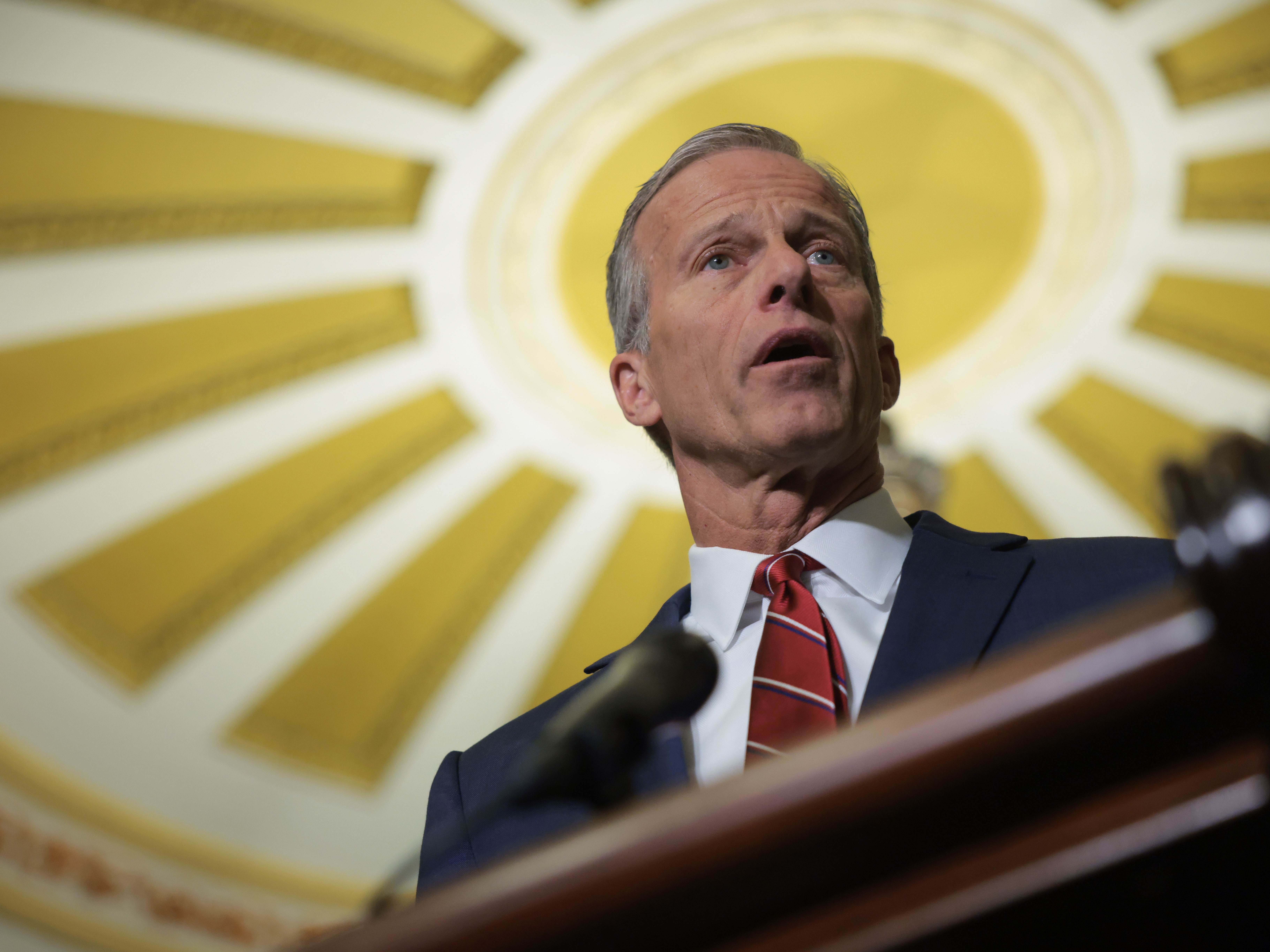 caption: Senate Majority Leader John Thune, R-S.D., speaks to reporters at the U.S. Capitol on Tuesday. Senate Republicans have unveiled a budget blueprint they hope to pass as they look to enact key elements of President Trump's domestic policy agenda.