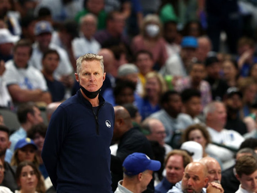 caption: Head coach Steve Kerr of the Golden State Warriors looks on Tuesday as his team plays the Dallas Mavericks in Game Four of the NBA's Western Conference Finals in Dallas. Before the game Kerr refused to take questions about basketball, instead expressing his frustration and anger about the Uvalde, Texas, shooting and elected officials' failure to pass gun control measures.
