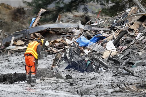 caption: A massive landslide engulfed Oso, Wash., on March 22.