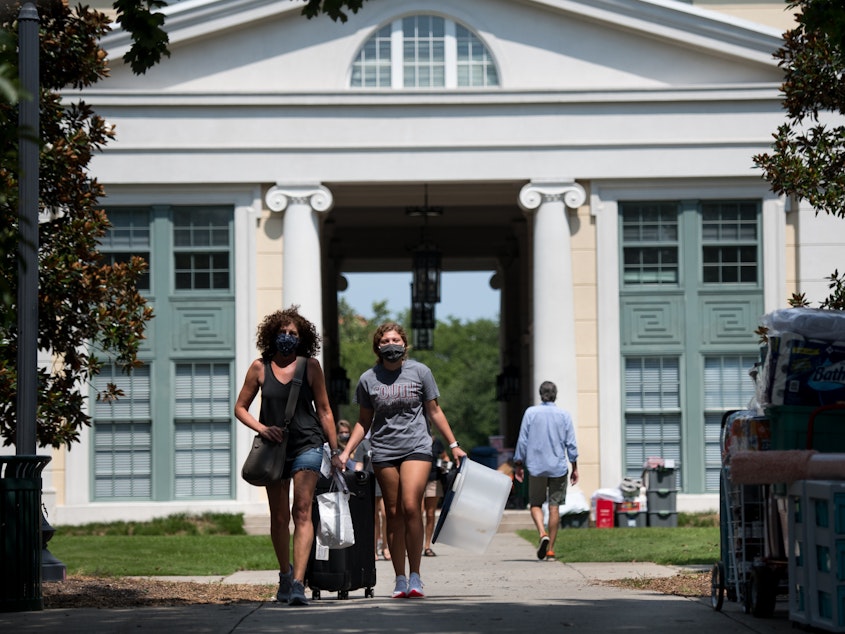 caption: As some campuses welcome students back, administrators are weighing their options to keep the community safe. Some are betting on frequent, regular testing.