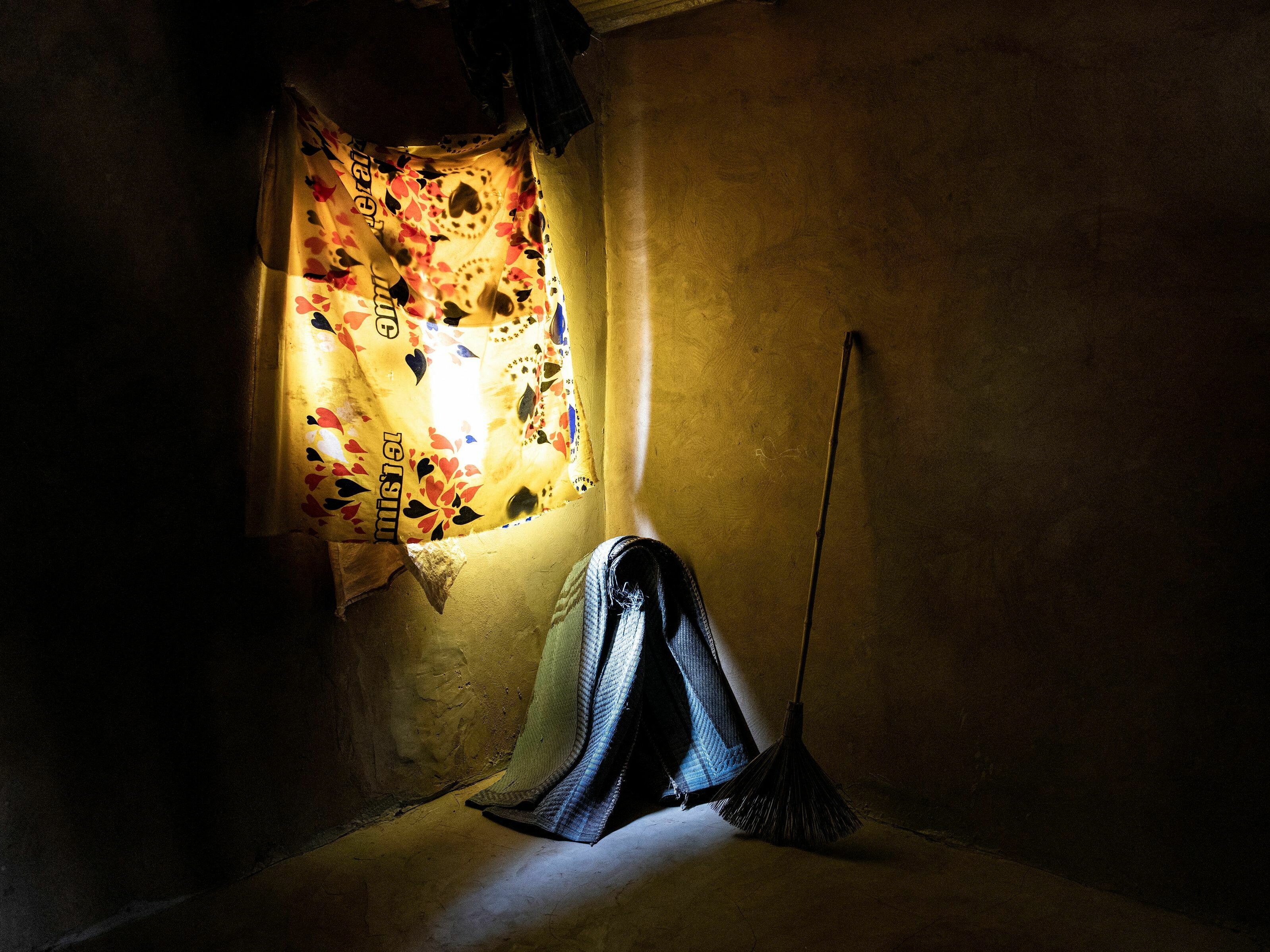 caption: An empty room is pictured in a concrete house in Matam, Senegal. Many families don't have electricity nor the means to own a fan or air conditioning to help quell the intense heat at night, temperatures can stay around 35 degree Celsius throughout the night.