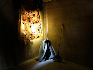 caption: An empty room is pictured in a concrete house in Matam, Senegal. Many families don't have electricity nor the means to own a fan or air conditioning to help quell the intense heat at night, temperatures can stay around 35 degree Celsius throughout the night.