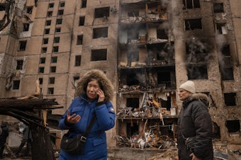 caption: Iryna Karetnykova and her partner Viktor Tyschenko were in the building when it was struck by a Russian missile in Kyiv, Ukraine, on Tuesday.