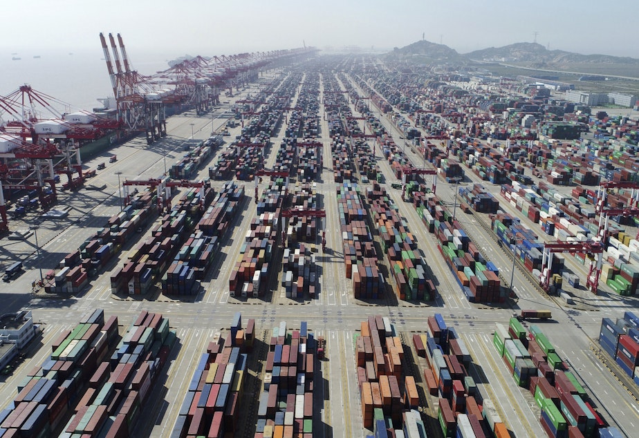 caption: A container dock of Yangshan Port in Shanghai.
