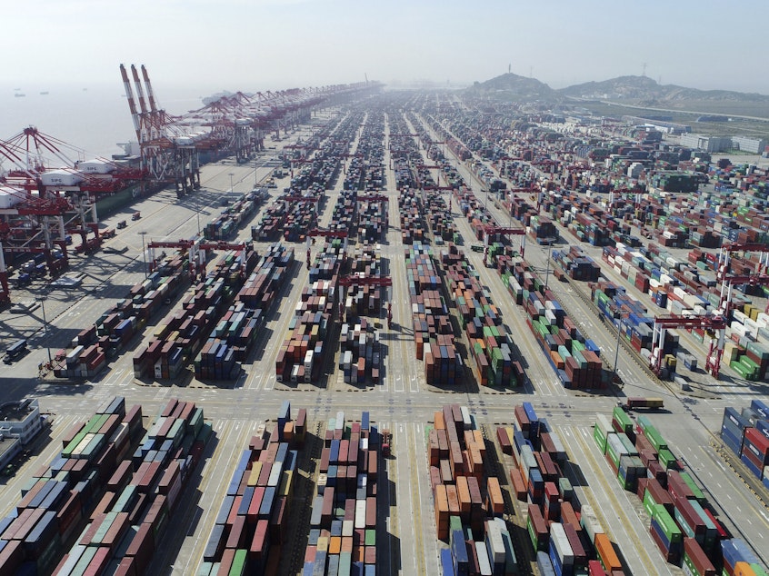 caption: A container dock of Yangshan Port in Shanghai.