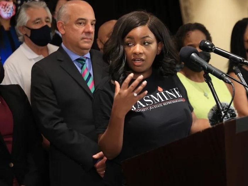 caption: Then-Texas state Rep. Jasmine Crockett is joined by Democratic lawmakers during a news conference on July 23, 2021, in Washington, D.C. Crockett, now a member of Congress, got into a verbal spat with Georgia Republican Marjorie Taylor Greene at a committee hearing last week.
