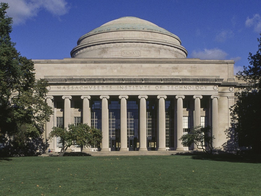 caption: MIT is agreeing to settle a lawsuit that claimed it allowed its workers to be hit with big fees in their retirement accounts.