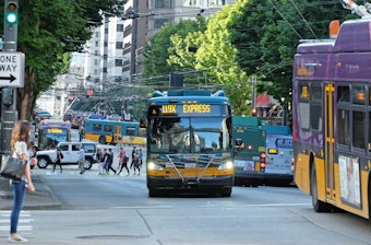 caption: Third Avenue in downtown Seattle. 