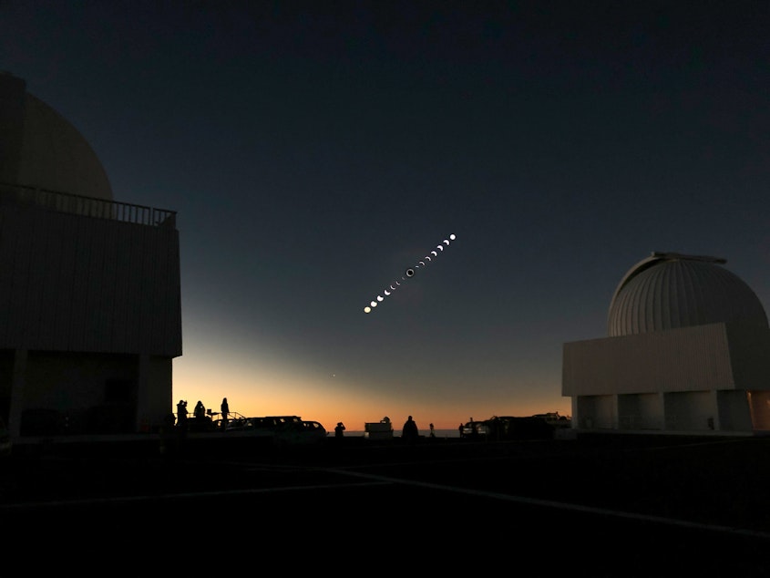 caption: This composite image details the progression of a total solar eclipse on Tuesday, July 2, 2019, that directly passed over the National Science Foundation’s Cerro Tololo Inter-American Observatory. 