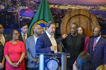 caption: Seattle Mayor Bruce Harrell announces a 24-member workgroup June, 12, 2023. The group is tasked with developing a local ordinance that will align Seattle municipal code with Washington state's new drug possession law. 