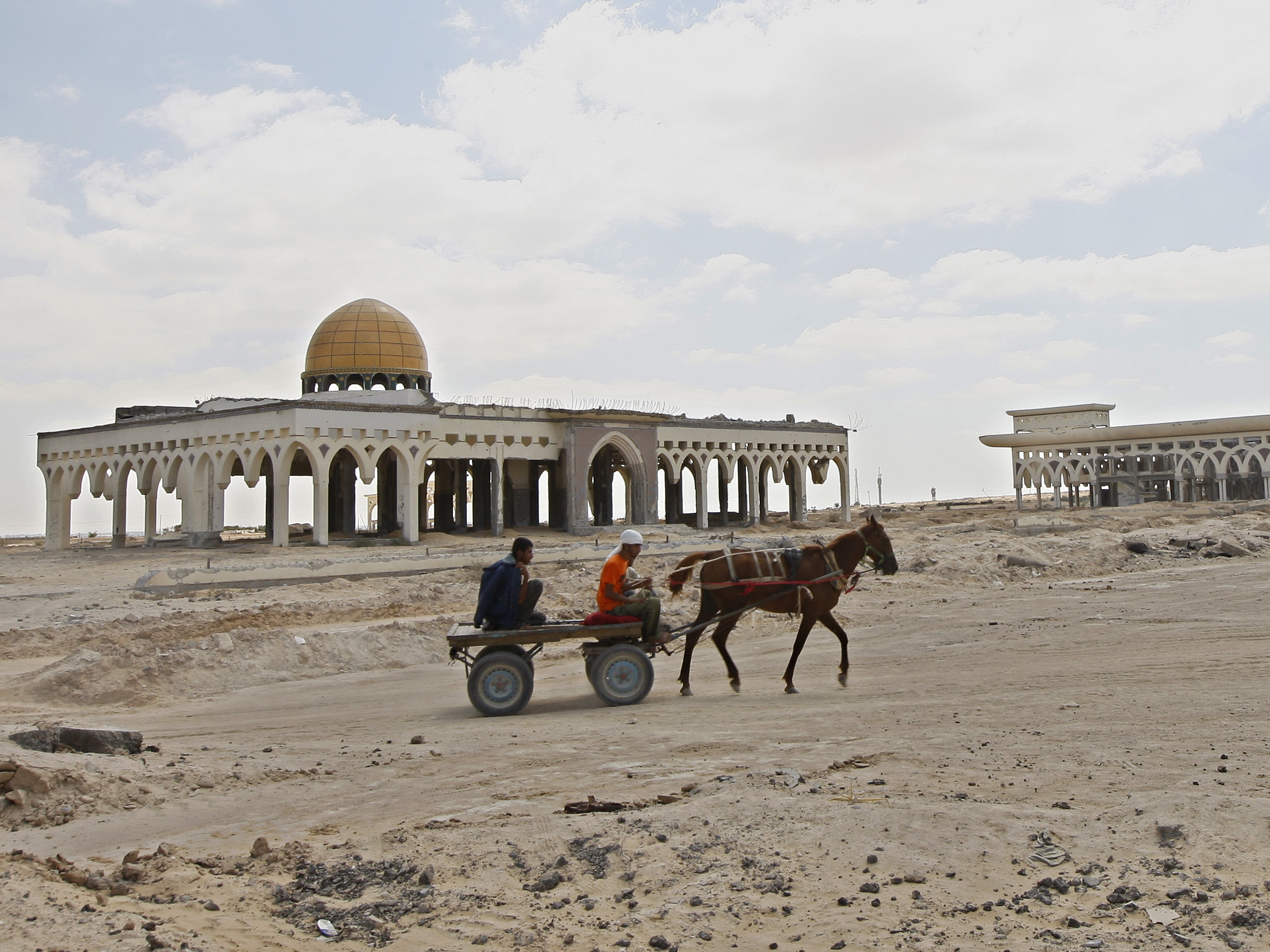 caption: The Gaza International Airport was shut down amid Israeli-Palestinian fighting in 2001, barely two years after it opened. Today it lies in ruins. This photo is from 2011.