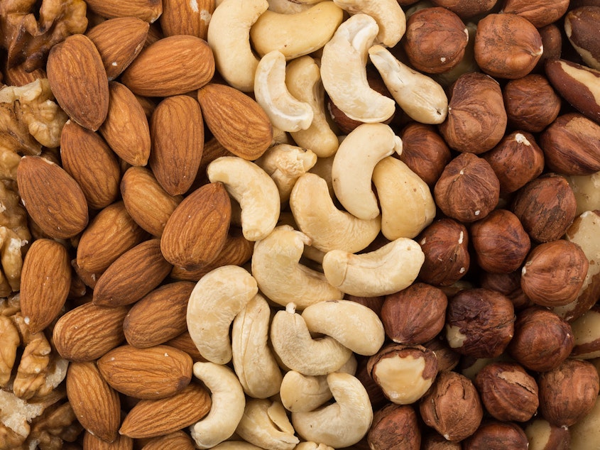 caption: U.S. adults put on about a pound a year on average. But people who had a regular nut-snacking habit put on less weight and had a lower risk of becoming obese over time, a new study finds.