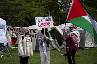 caption: University of Washington students created UW Palestine Encampment on Monday, April 29, 2024, on the University of Washington Quad in Seattle. The students are demanding that the University cut ties with Boeing. 