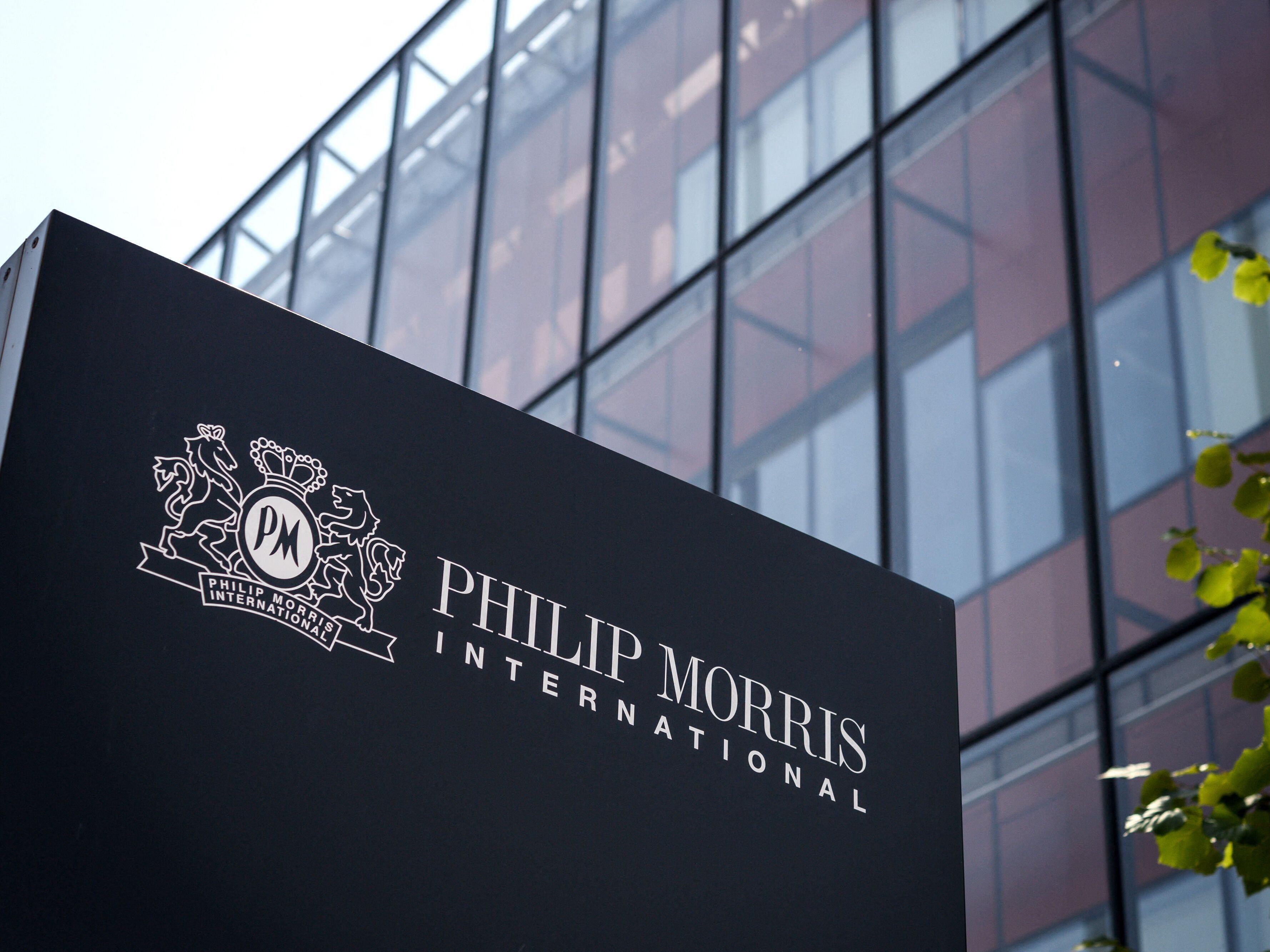 caption: Cigarette and tobacco company Philip Morris International is selling Vectura<strong>, a </strong>British pharmaceutical firm that makes asthma inhalers. An office of the company is seen here in Neuchatel, western Switzerland.