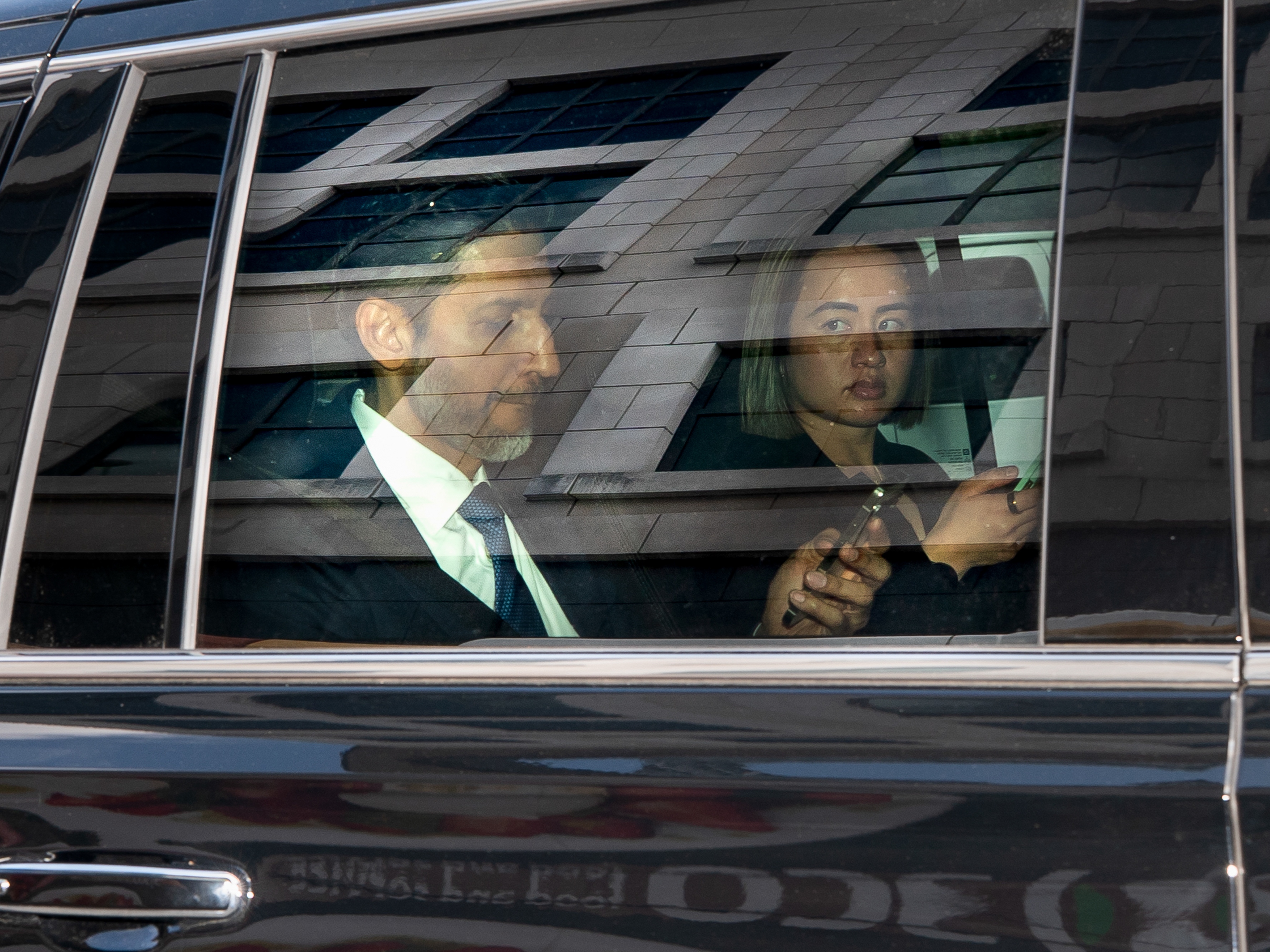 caption: Sundar Pichai, chief executive officer of Alphabet Inc., left, exits federal court in Washington, DC, US, on Wednesday, April 30, 2025.