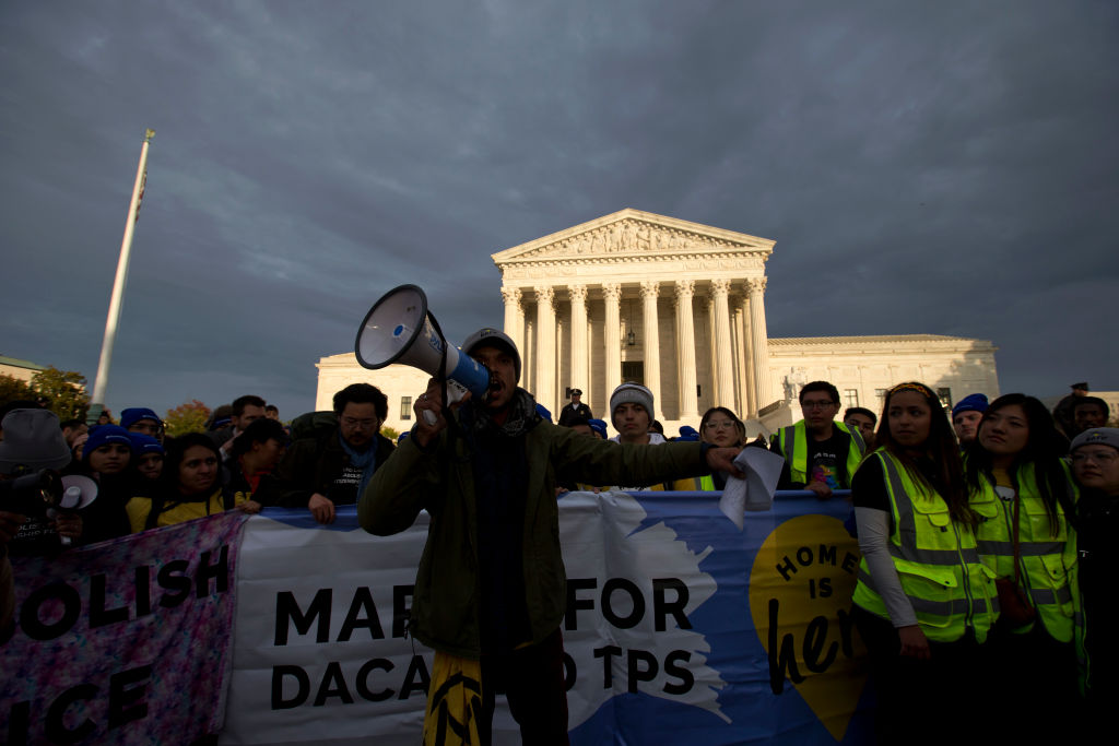 caption: Demonstrators arrive in front of the U.S. Supreme Court during the march for DACA and TPS on November 10, 2019 in Washington D.C. (Jose Luis/AFP/Getty Images)