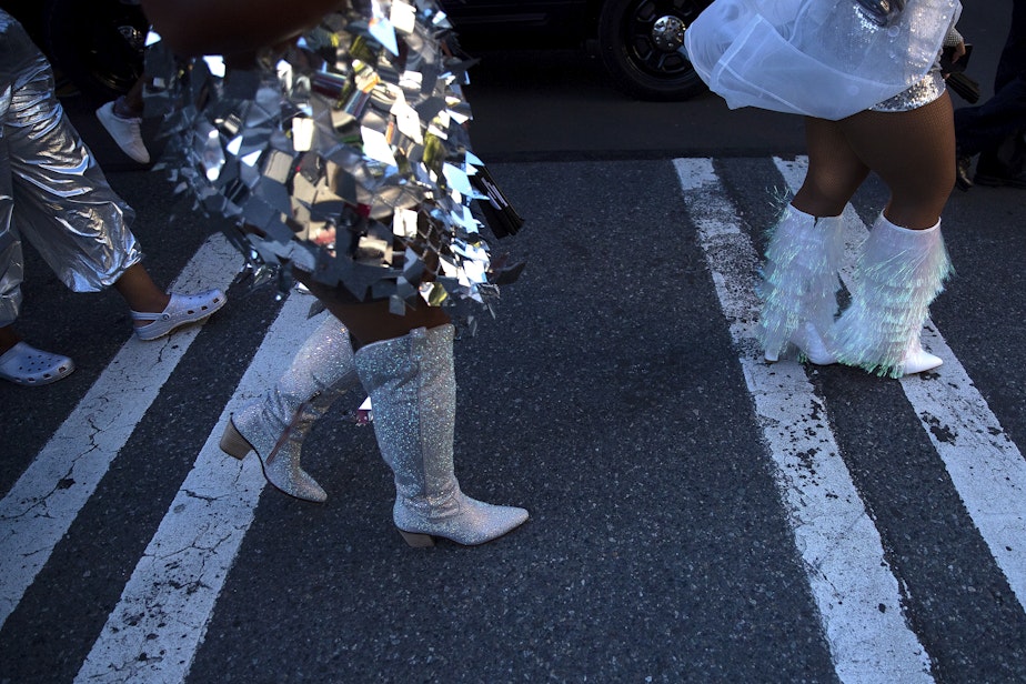 caption: Beyonce fans make their way to Lumen Field before on Thursday, Sept. 14, 2023, in Seattle.