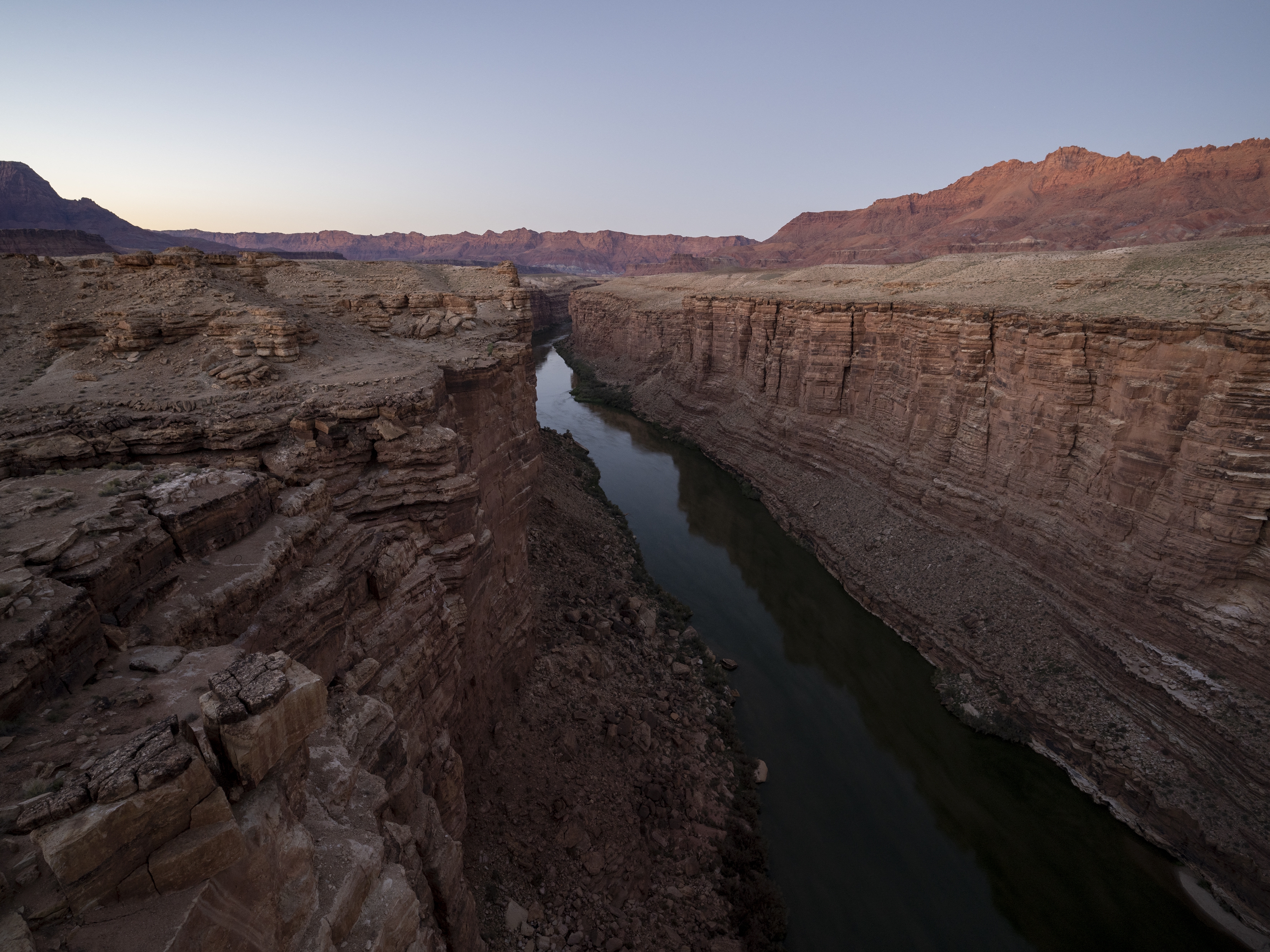 caption: A view of the Colorado River from the Navajo Bridge in Marble Canyon, Ariz. At least 16 people have died at the Grand Canyon this year, putting the park on pace to eclipse its average of 17 deaths per year. 