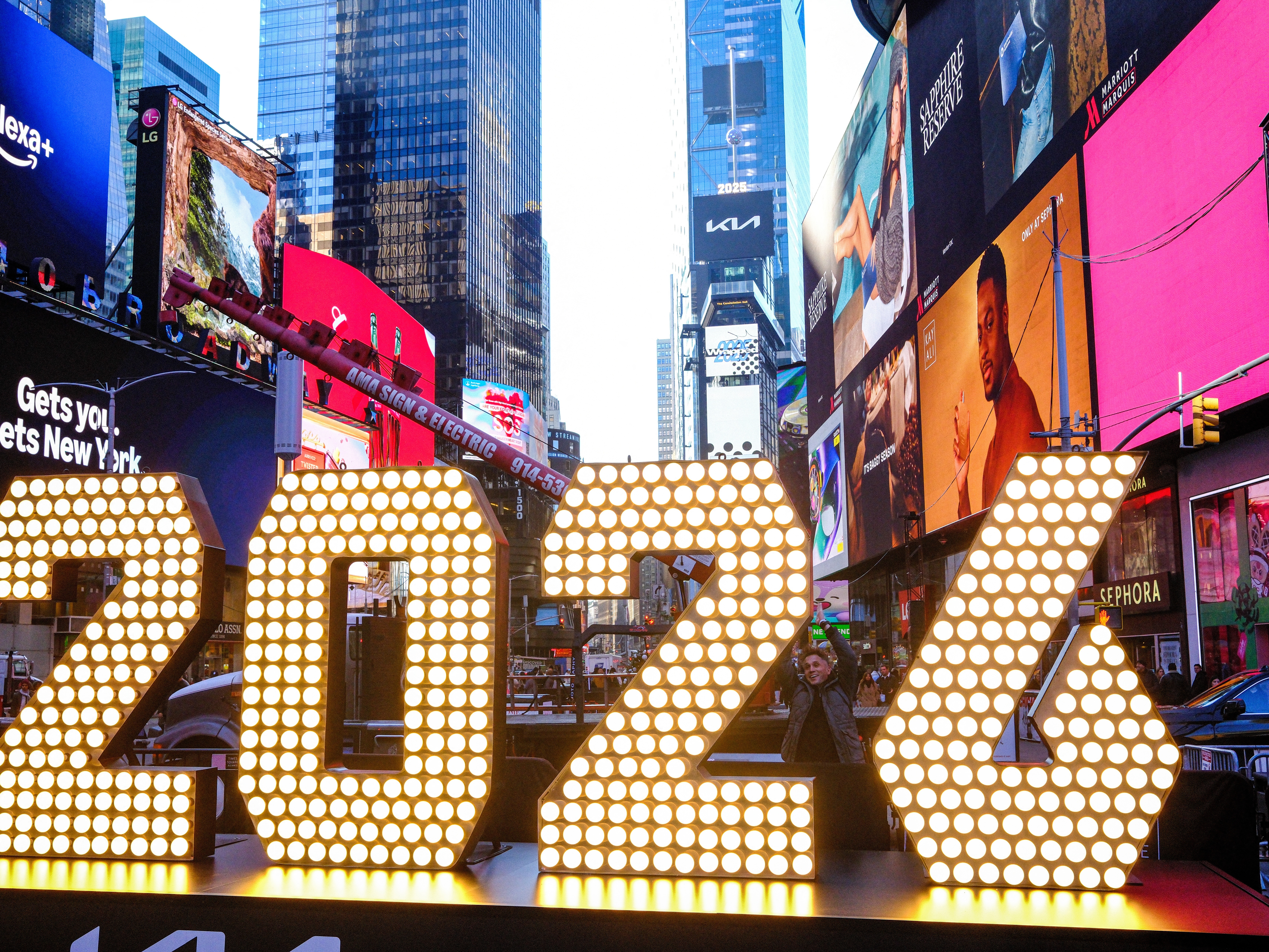 caption: Seven-foot-tall "2026" numerals are displayed after an illumination ceremony in Times Square in New York City on Dec. 18, 2025.
