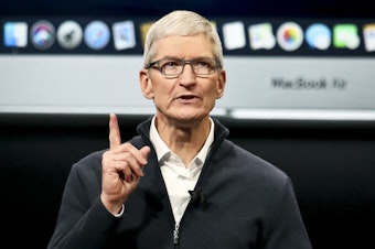 caption: Apple CEO Tim Cook attributed slower sales in China in part to the devaluation of the yuan.