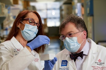 caption: Drs. Maria Elena Bottazzi and Peter Hotez with The World's COVID-19 Vaccine at the Center for Vaccine Development, 2021.