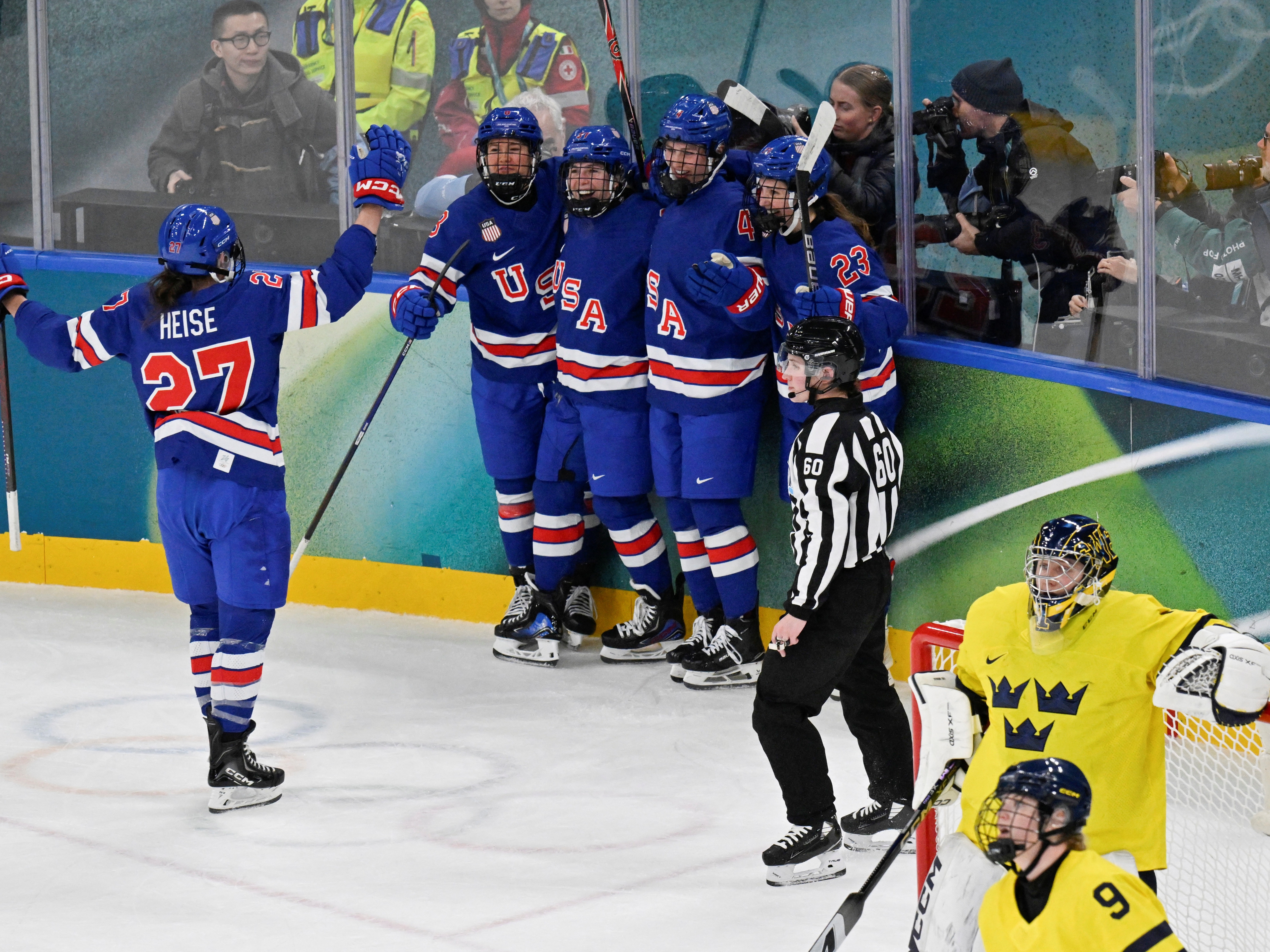 caption: Team USA forward Taylor Heise, #27, celebrates scoring her team's second goal during Monday's Olympic semifinal match against Sweden. After a 5-0 win, the U.S. now advances to play in Thursday's gold medal match.
