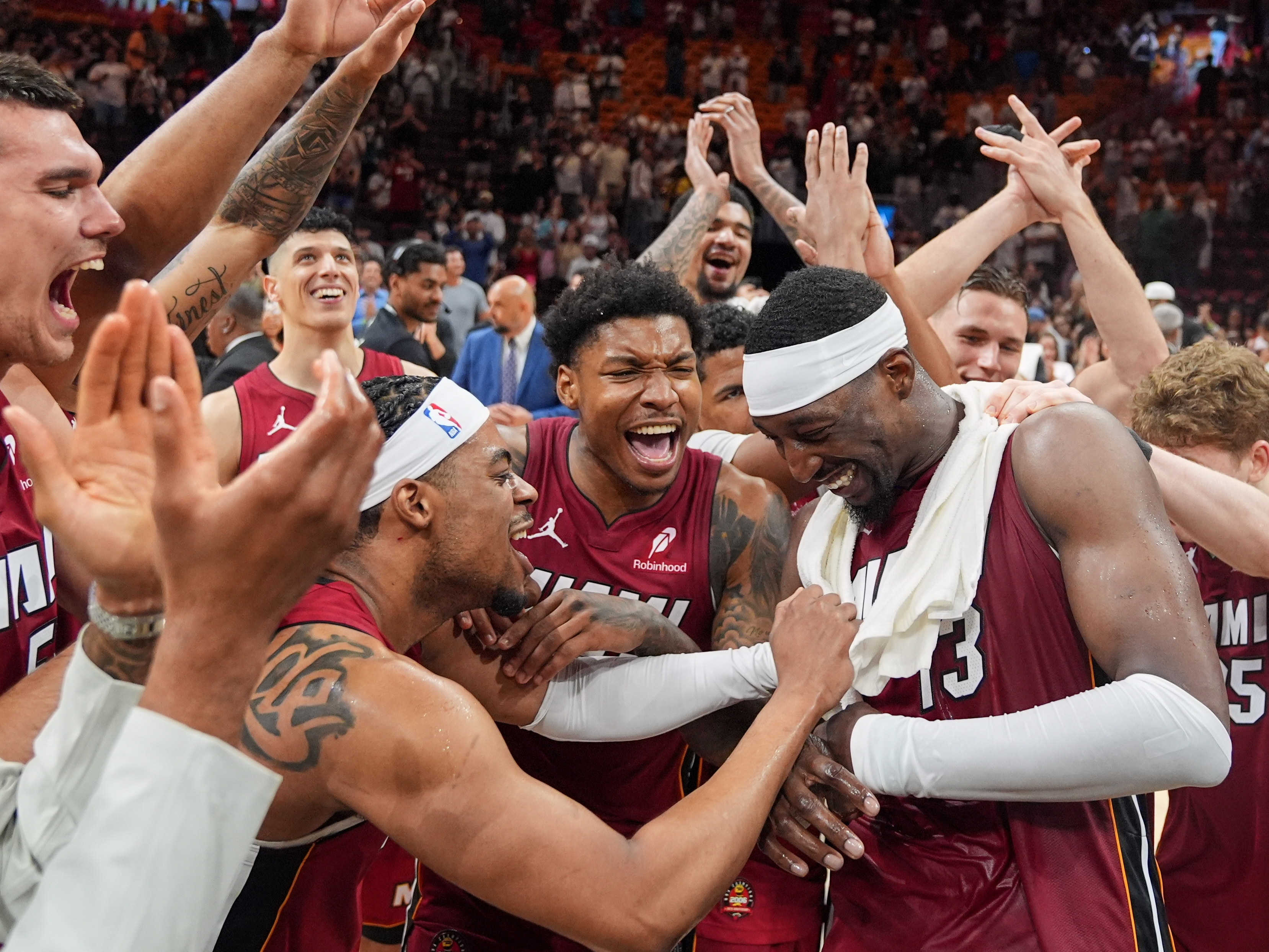 caption: Miami Heat teammates celebrate center Bam Adebayo (13) after he scored 83 points, the second-highest single game total in NBA history, in an NBA basketball game against the Washington Wizards, Tuesday, March 10, 2026, in Miami.